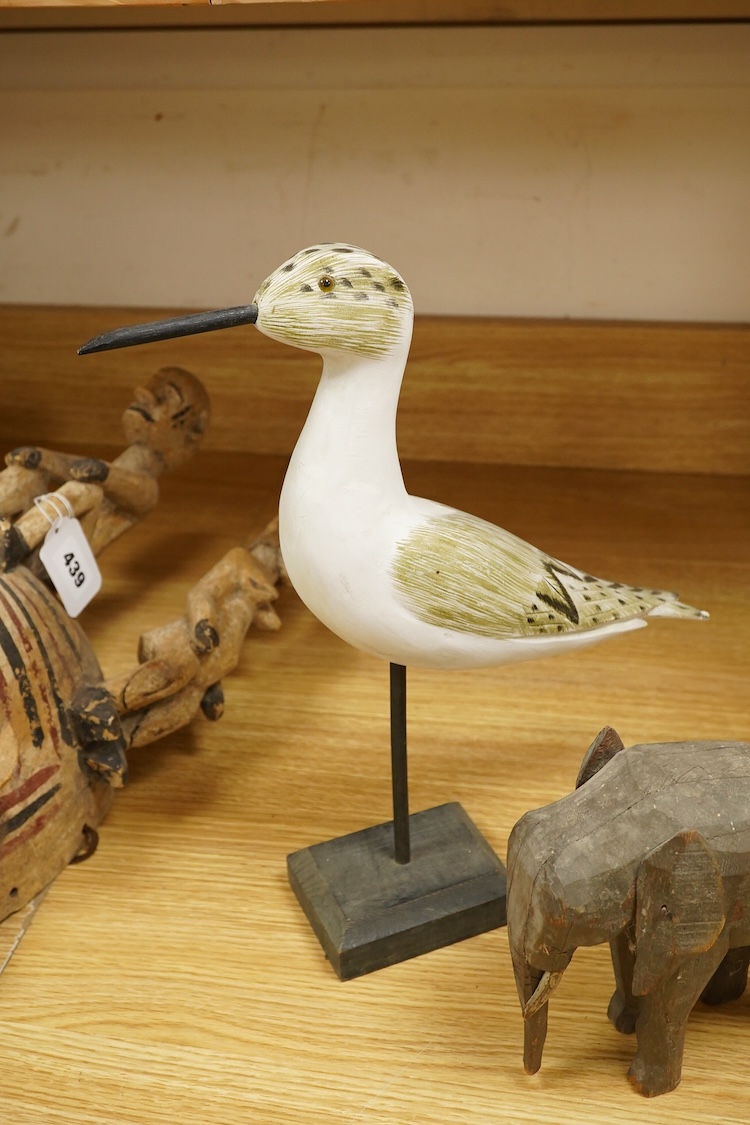 A carved and painted decoy duck, two carved elephants and two other painted birds, tallest 41cm
